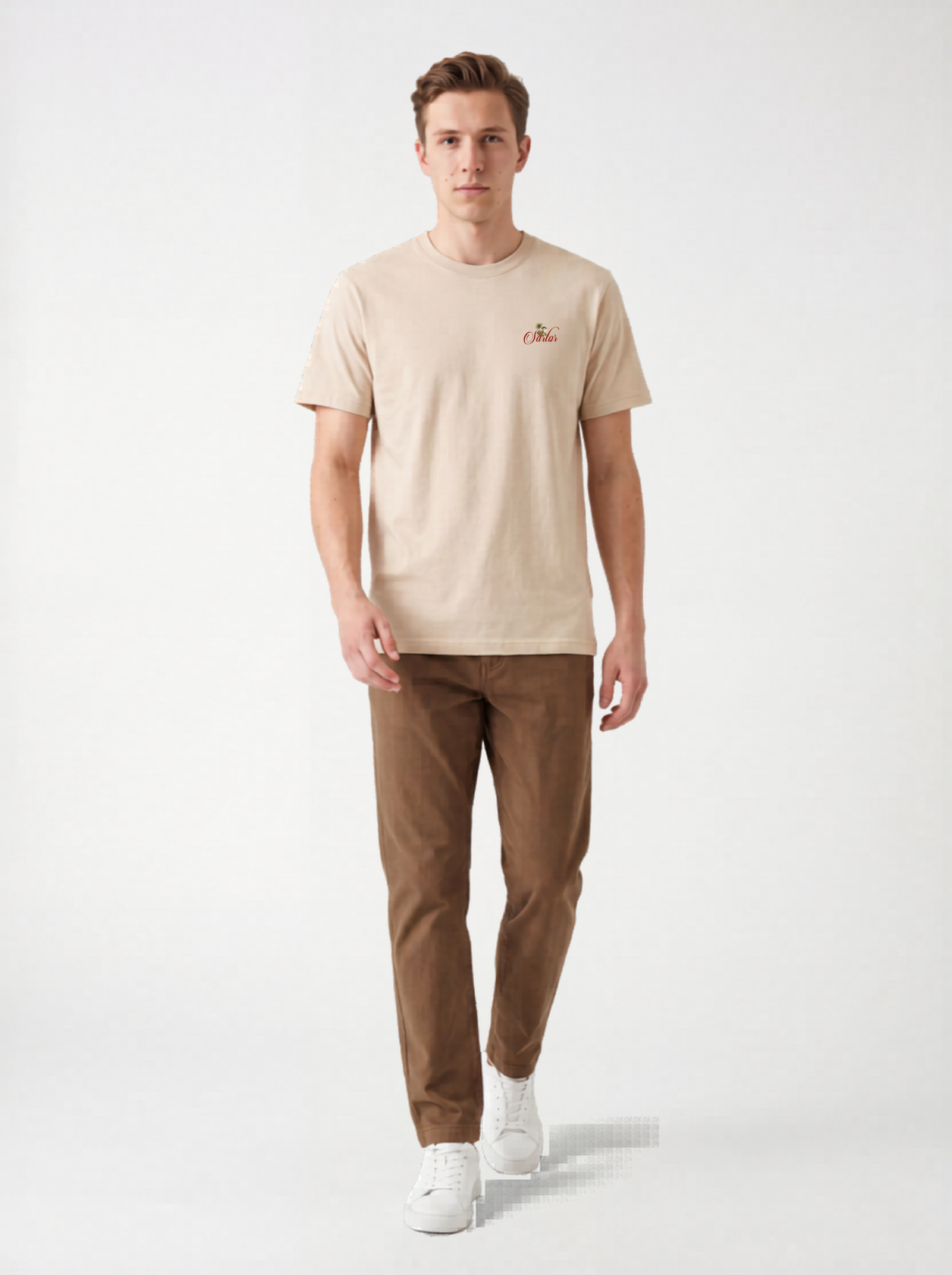 Front view of male model wearing white SARTOR Island Villa T-shirt